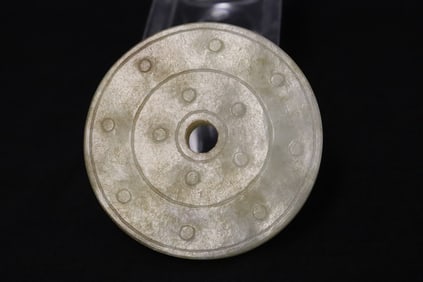 A Chinese white jade disc