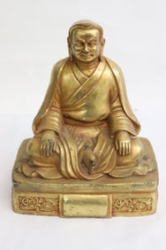 A fine gilt bronze sculpture of deity