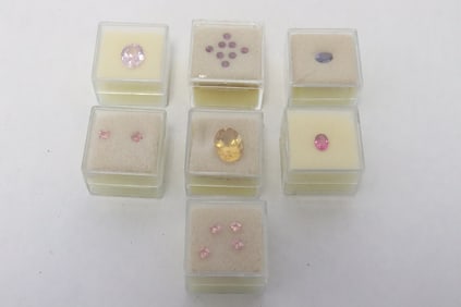 7 boxes of loose gems