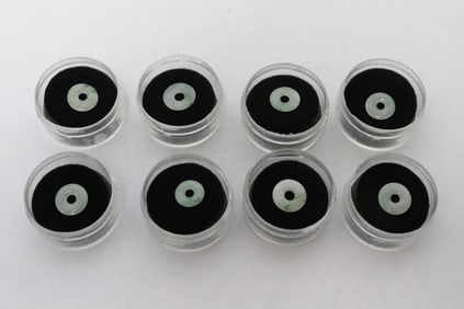 8 translucent jadeite discs