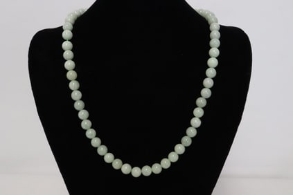 A jadeite bead necklace