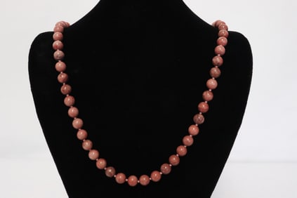 A rhodonite bead necklace