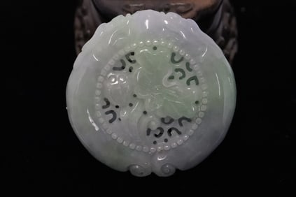 A lavender jadeite carved pendant