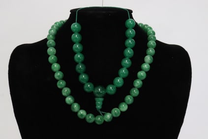 2 jadeite like bead pieces