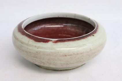 A red and white porcelain brush wash