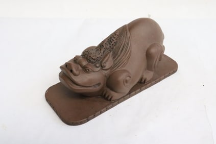 Yixing sculpture to depict qilin as scroll weight
