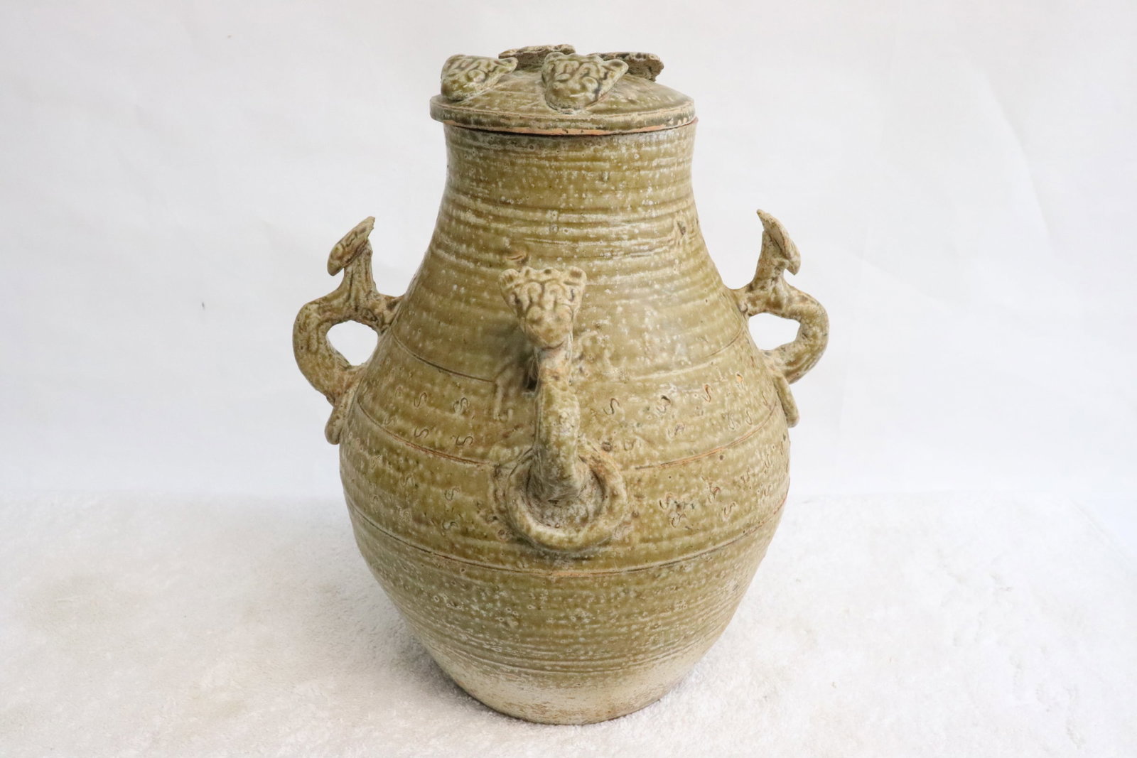 light brown glazed covered jar w/ 4 handles (1 of 10)
