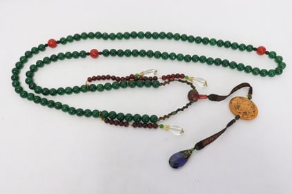 A long Peking glass bead necklace