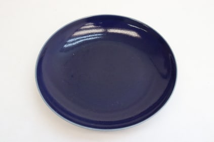 A blue glazed porcelain plate