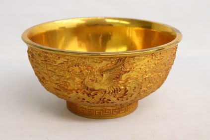 A gilt metal bowl