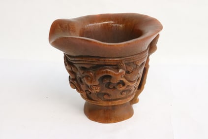 A horn style libation cup