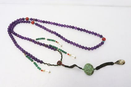 A long Peking glass necklace