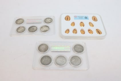 3 panels of reproduction coins