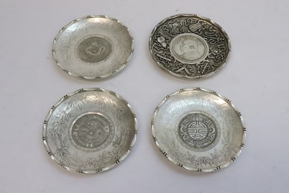 4 white bronze dishes
