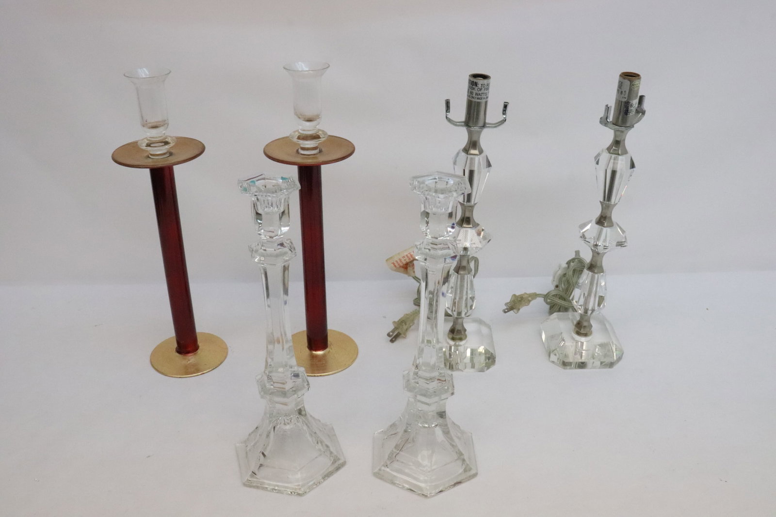6 pieces: 6 pieces; 2 pairs crystal/ art glass tall candle sticks (11.75"x4"x4.65" - 13.8"x3.65"x3.65"), and pair crystal table lamps in excellent condition (13.8"x3.75"dia ea)
