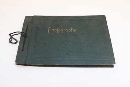 A WWII era photo album with military photos