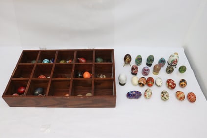 Large collection of Easter eggs.with display case