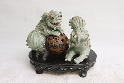 Pair earthenware sancai fulions with ball