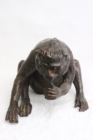 A very heavy bronze sculpture of monkey