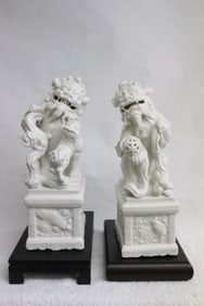 Pair Chinese large blanc de shin fulions on stands