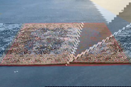 A Persian style room size rug