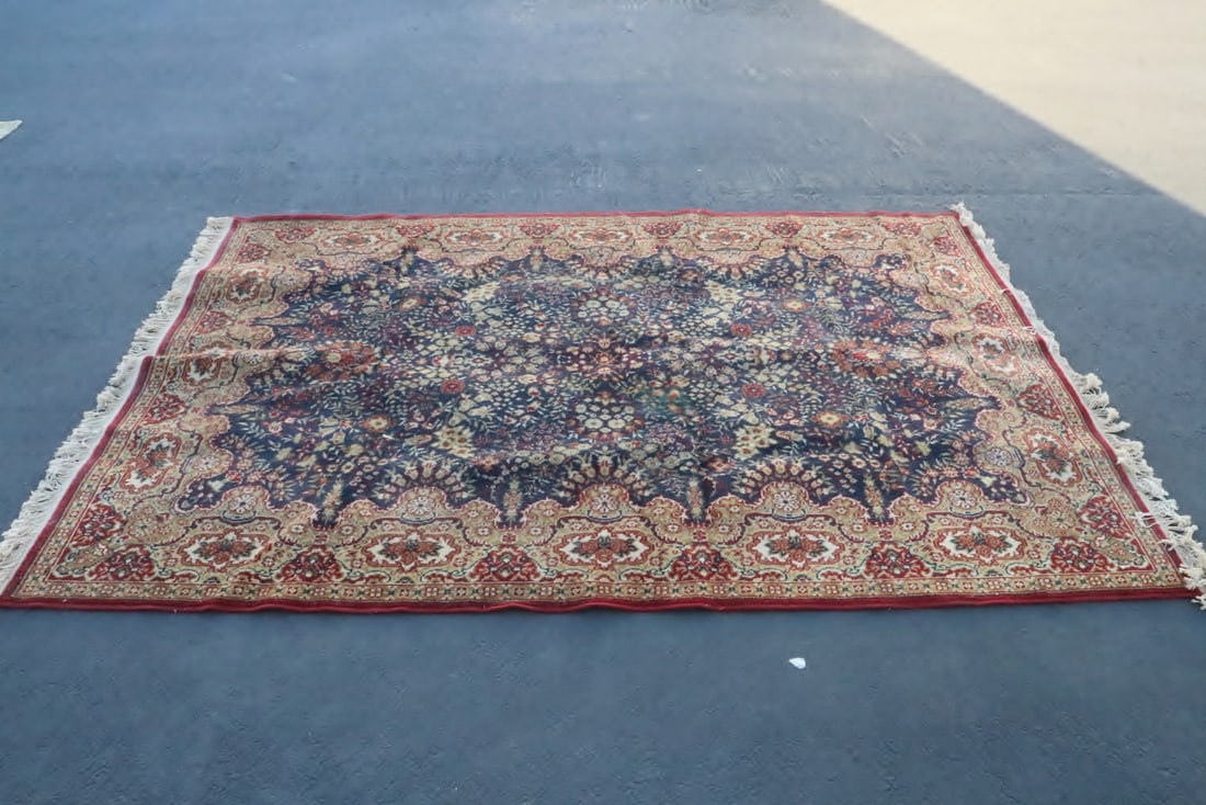 A Persian style room size rug: A Persian style room size rug, 67.5"x96"