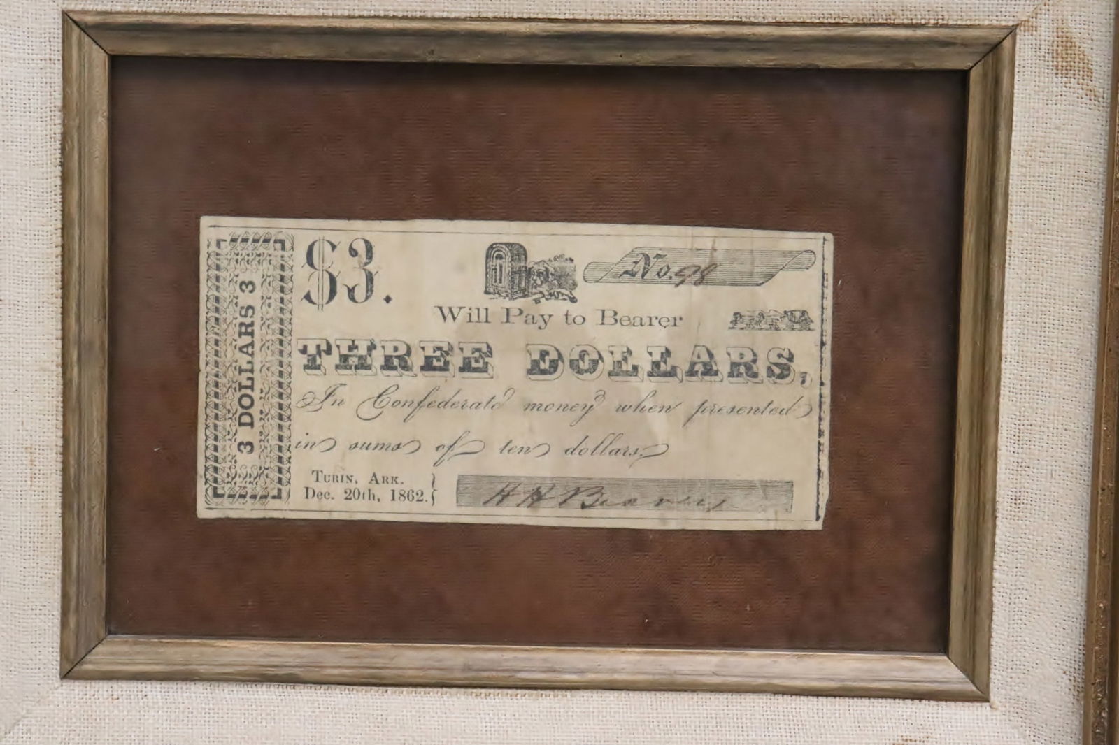 A framed Confederate 3-dollar banknotes: A framed Confederate 3-dollar banknotes issued by Turis Arkansas, Dec. 20th, 1862
