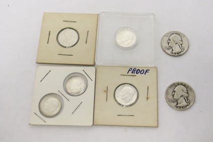 7 US silver coins; 5 dimes, 2 quarters