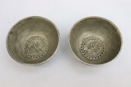 2 white bronze bowls