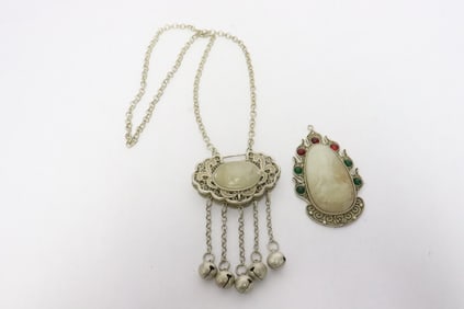 2 white metal pieces