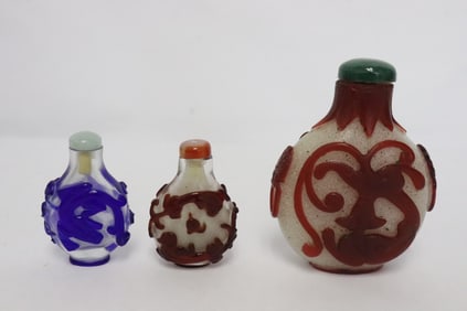 3 overlay Peking glass snuff bottles