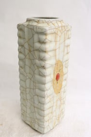 A tall crackleware porcelain vase