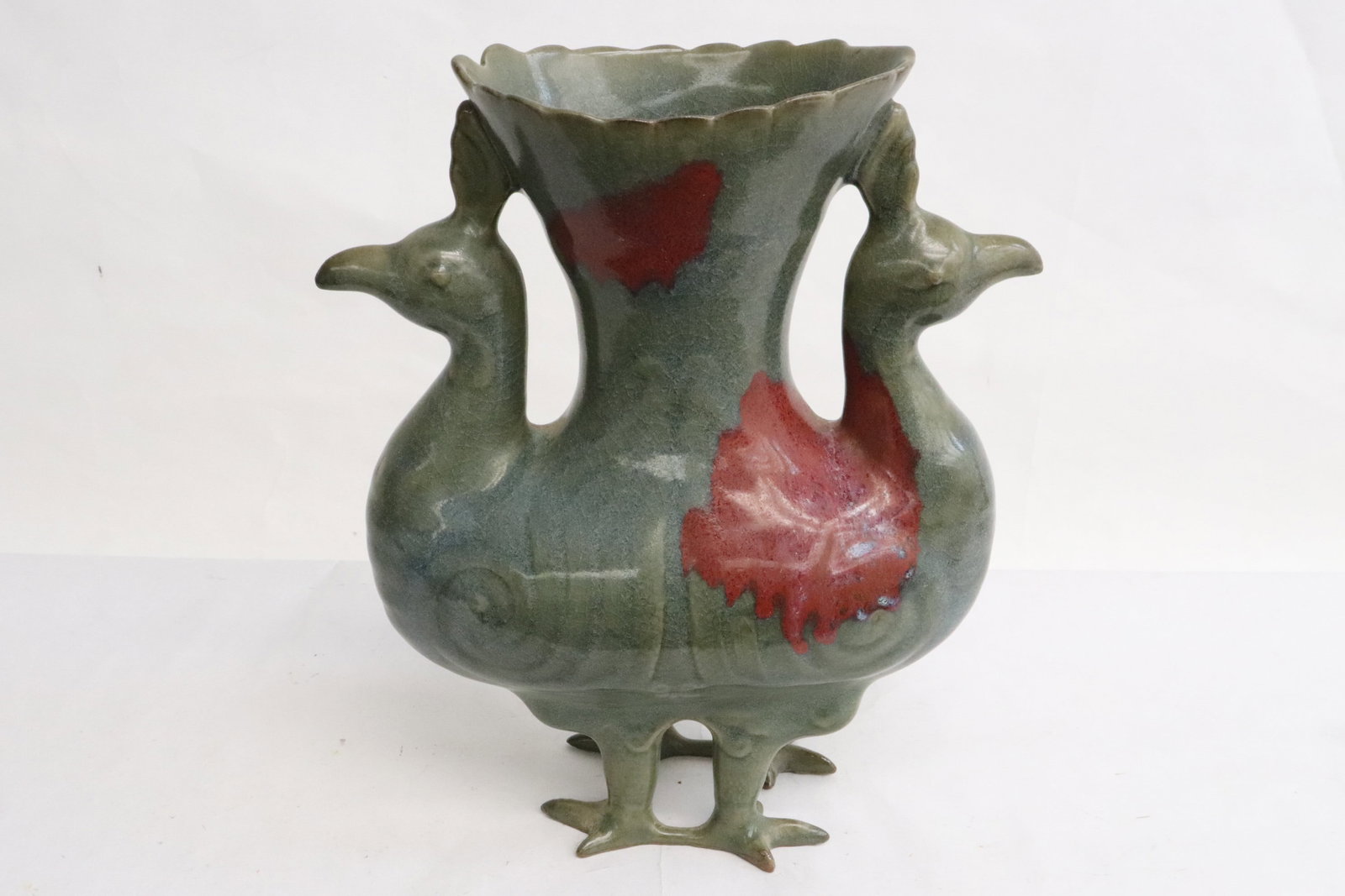 Unusual Chinese light blue porcelain vase: Unusual Chinese light blue porcelain vase in the form of double peacock, 9.6"x8"x4"