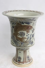 A blue, red and white porcelain pedestal vase