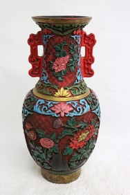 A cinnabar style vase