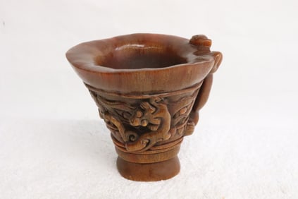 A horn style libation cup