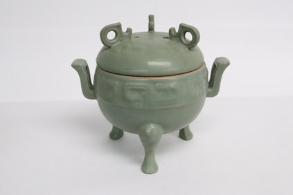 A celadon covered censer