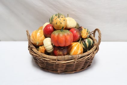 Basket full of decorative fruit