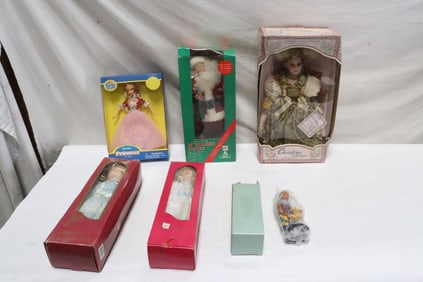 6 dolls, new in box