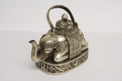 White bronze teapot in the form of elephant