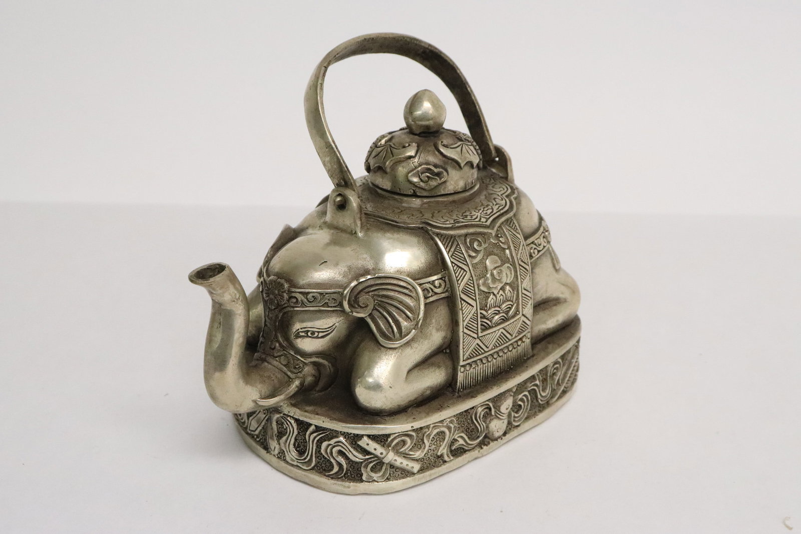 White bronze teapot in the form of elephant: White bronze teapot in the form of elephant, 4.15"x5.3"x3.35"