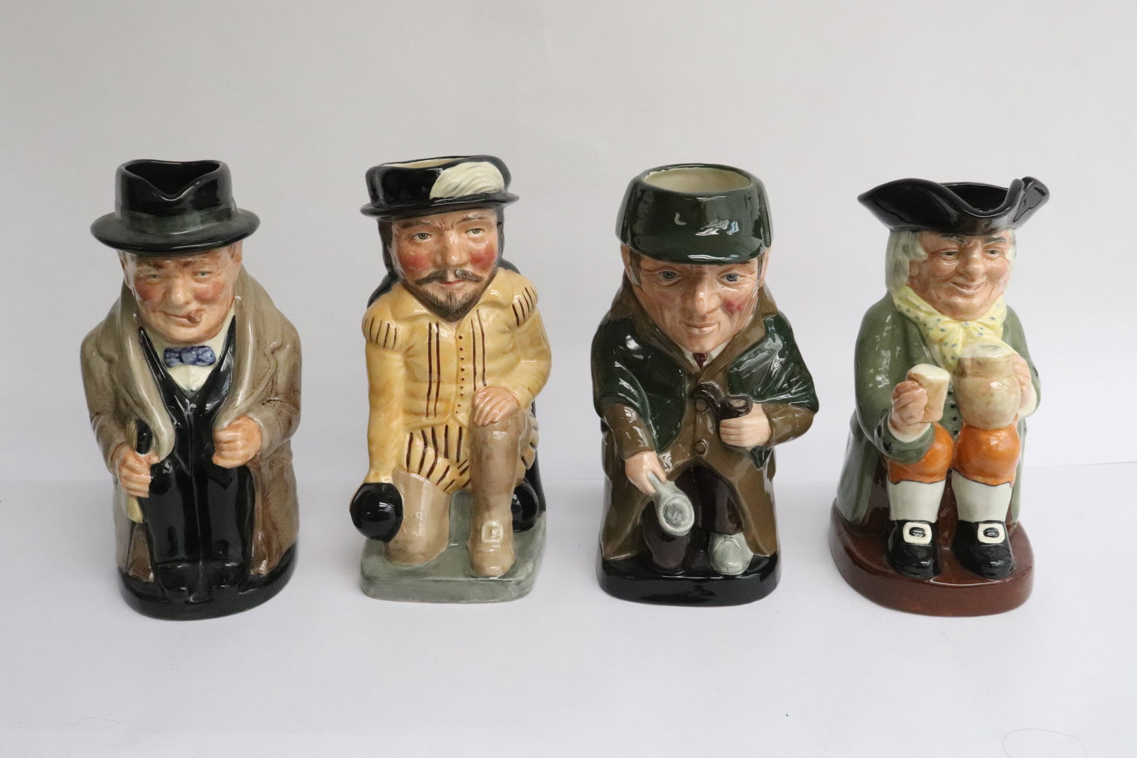 4 Royal Doulton character mugs: 4 Royal Doulton character mugs, 8.7"x6.25"x4.35" - 9.1"x6.3"x4.2"