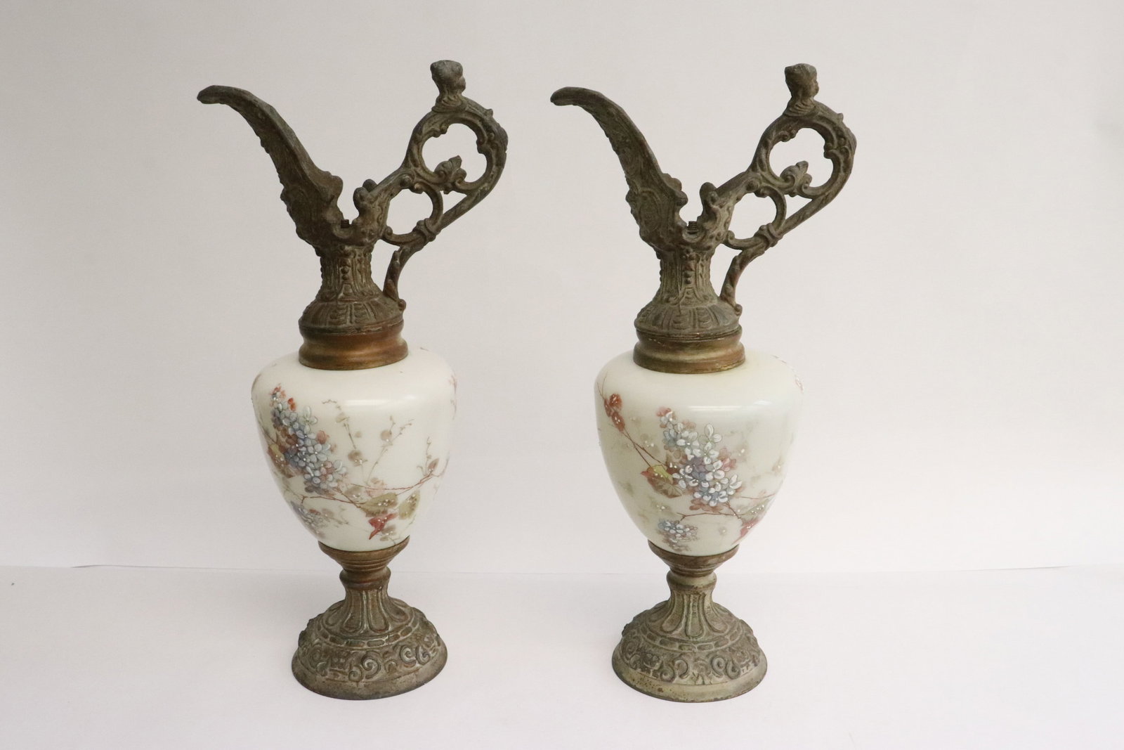 2 European metal and painted glass ewers: 2 European metal and painted glass ewers, 14"x6.6"x4.7" ea