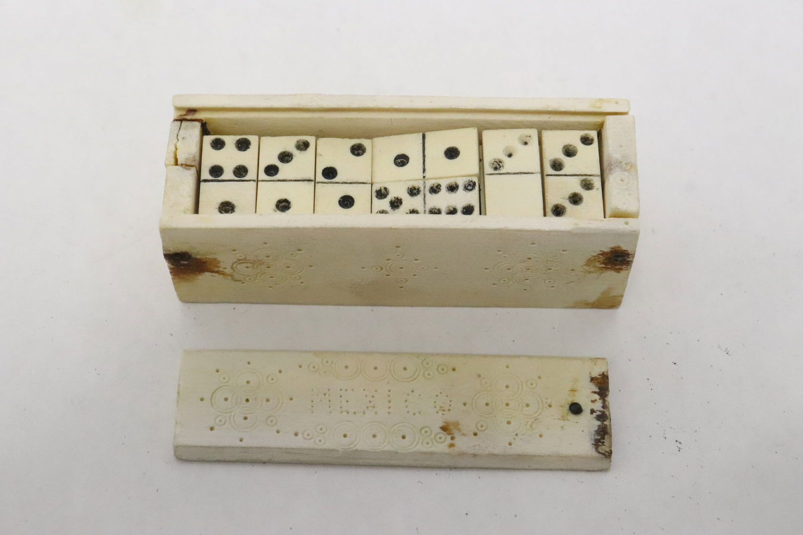 Bone carved domino set: Bone carved domino set, 2.85"x1"x0.9"