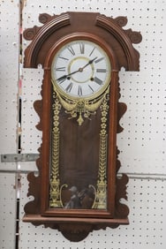 A wall hanging keywind clock