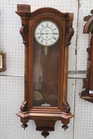 Antique walnut cased keywind wall clock