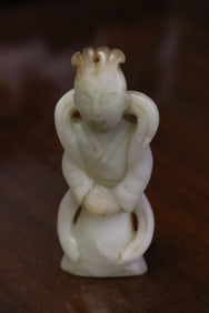 A white jade carved figure