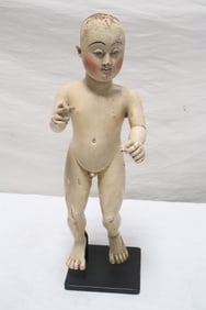 Antique wood carved doll