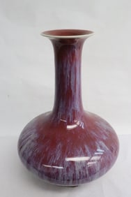 A red background porcelain vase