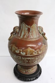 A brown glazed porcelain vase